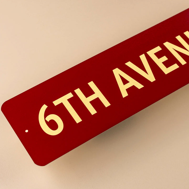 6th Ave Directional Sign