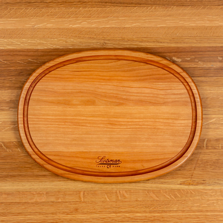 Cherry Oval Serving Board with Juice Groove